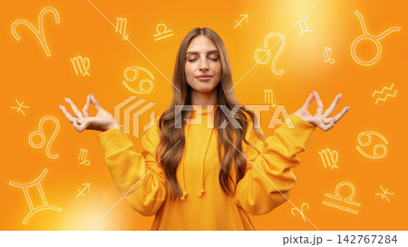 Zodiac signs surround a person practicing meditation with an orange background Zodiac signs surround a person practicing meditation with an orange background 142767284
