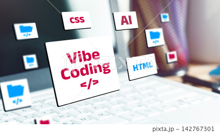 Vibe coding with focus on programming languages and tools displayed on a laptop screen 142767301