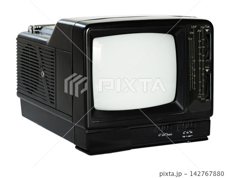 Old black and white television set placed on a flat surface in a simple room Old black and white television set placed on a flat surface in a simple room 142767880