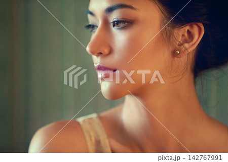 Girl, serious and glow with beauty in studio with diy aesthetics, organic makeup and elegant with cosmetics for shine. Woman, thinking and isolated with green background, foundation and bold look. Girl, serious and glow with beauty in studio with diy aesthetics, organic makeup and elegant with cosmetics for shine. Woman, thinking and isolated with green background, foundation and bold look. 142767991