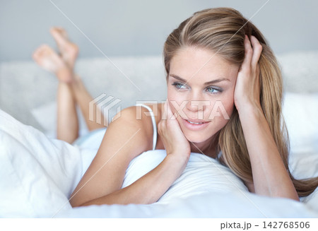 Woman, thinking and calm in bedroom with pillow for resting, relaxing or daydreaming for morning contemplation. Face, home and female person on cushion, thoughtful moment and remember or memory Woman, thinking and calm in bedroom with pillow for resting, relaxing or daydreaming for morning contemplation. Face, home and female person on cushion, thoughtful moment and remember or memory 142768506