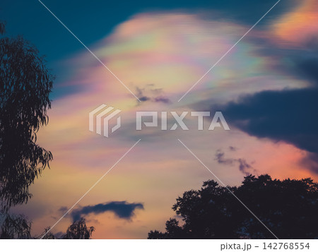 Rare iridescent cloud phenomenon over Rare iridescent cloud phenomenon over 142768554