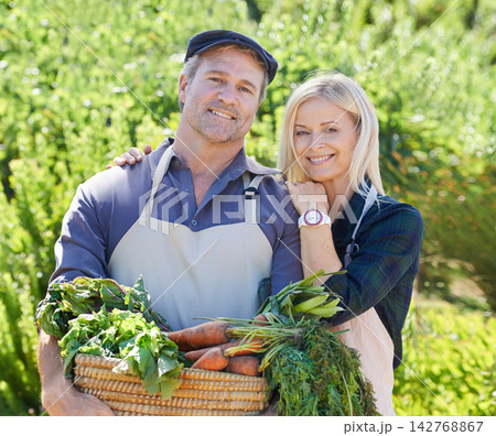 Portrait, mature couple and happy on farm with vegetables, nutrition and gardening together. Man, woman and eco friendly with harvest for sustainability and smile for vegan diet in environment 142768867