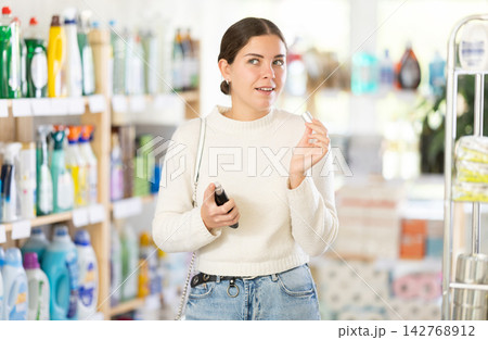 woman chooses a perfume woman chooses a perfume 142768912