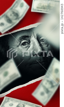 Close view of a dollar bill with an eye-catching background and torn paper edges Close view of a dollar bill with an eye-catching background and torn paper edges 142768943