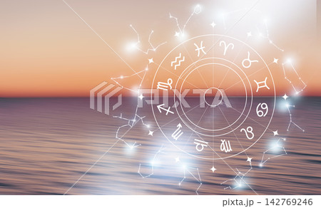Astrology zodiac signs over a sunset view by the ocean Astrology zodiac signs over a sunset view by the ocean 142769246
