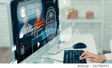 Deep fake technology displayed on a computer screen showing digital characters and virtual interactions 142769341