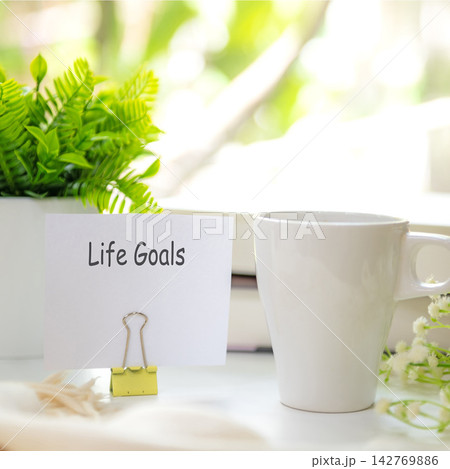 Notebook with my life goals message on notepad inspiring new beginnings and future life planning. Goal Life Wellness Concept. Notebook with my life goals message on notepad inspiring new beginnings and future life planning. Goal Life Wellness Concept. 142769886