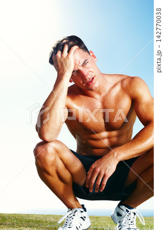 Exercise, tired and man outdoor for fitness, training or healthy body muscle on grass by blue sky in summer. Sport break, fatigue and person in nature to relax, rest or thinking of wellness workout Exercise, tired and man outdoor for fitness, training or healthy body muscle on grass by blue sky in summer. Sport break, fatigue and person in nature to relax, rest or thinking of wellness workout 142770038