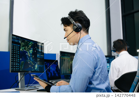 Professional monitoring aviation data on digital radar screens, analyzing flight tracking, aircraft navigation and advanced aerospace Professional monitoring aviation data on digital radar screens, analyzing flight tracking, aircraft navigation and advanced aerospace 142770448