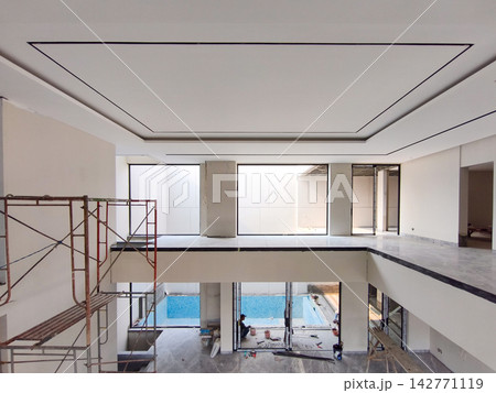 Two story modern luxury house interior under construction Two story modern luxury house interior under construction 142771119