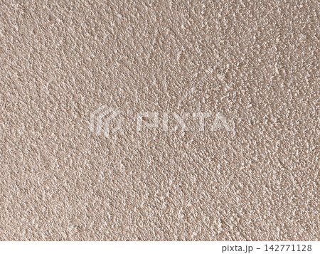 Texture of rough sandy beige cement plaster wall Texture of rough sandy beige cement plaster wall 142771128