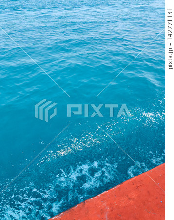 Clear blue ocean water texture with foam Clear blue ocean water texture with foam 142771131