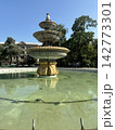 Antique fountain in the city park in summer. 142773301