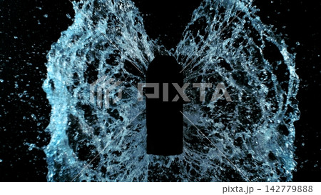 Freeze Motion of Splashing Water on Black Bottle Shape Isolated on Black Background Freeze Motion of Splashing Water on Black Bottle Shape Isolated on Black Background 142779888