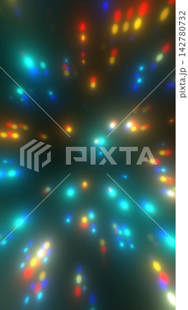 Soft cyan, red, yellow, and blue lights form a colorful bokeh pattern across a dark background with a hazy atmospheric glow. Soft cyan, red, yellow, and blue lights form a colorful bokeh pattern across a dark background with a hazy atmospheric glow. 142780732