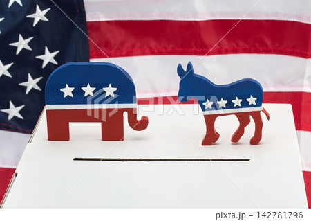 Republican and democrat symbols on ballot box against us flag 142781796