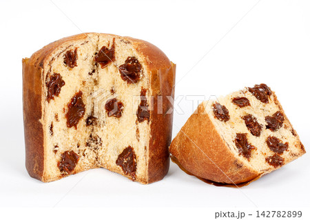 Sliced Brazilian chocolate filled panettone isolated on a white background. 142782899