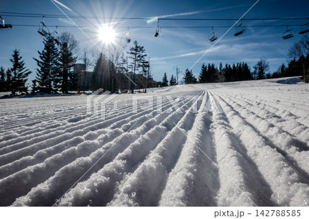 Freshly Groomed Snow at Snowshoe West Virginia Ski Resort with Corduroy Texture and Sunny Winter Mountain Conditions Freshly Groomed Snow at Snowshoe West Virginia Ski Resort with Corduroy Texture and Sunny Winter Mountain Conditions 142788585