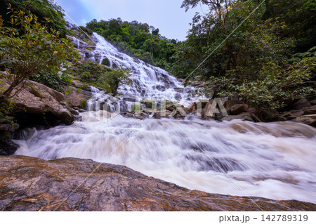 Mae Ya waterfall it beautiful most famous in Doi Inthanon National Park, Chiang mai, Thailand. Mae Ya waterfall it beautiful most famous in Doi Inthanon National Park, Chiang mai, Thailand. 142789319