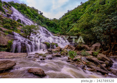 Mae Ya waterfall it beautiful most famous in Doi Inthanon National Park, Chiang mai, Thailand. Mae Ya waterfall it beautiful most famous in Doi Inthanon National Park, Chiang mai, Thailand. 142789320