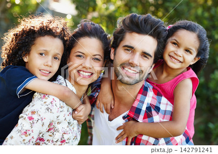 Family, portrait and piggyback children in garden and embrace in backyard with love and support. Carry, kids or happy interracial parents outdoor on adventure, journey or travel in park on vacation Family, portrait and piggyback children in garden and embrace in backyard with love and support. Carry, kids or happy interracial parents outdoor on adventure, journey or travel in park on vacation 142791241