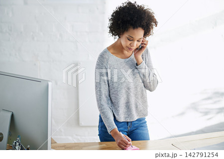Businesswoman, phone call and notes with communication in office for networking, conversation and chat. Creative person, designer and smartphone with discussion, talking and consulting in workplace 142791254