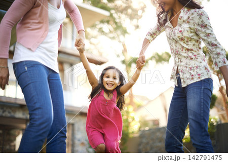 grandmother, mom or girl in garden to play with love, care or wellness outdoors for bonding in home. Holding hands, family and happy child in nature to swing with grandma, kid and smile with parent 142791475