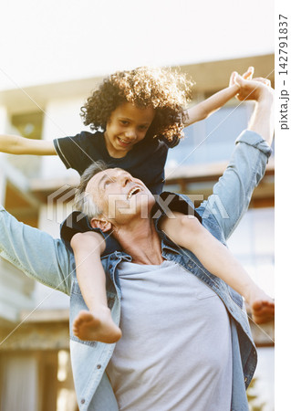 Happy, father and child fly with piggyback in garden and backyard with freedom and support. Kid, games or dad in interracial family outdoor of house on holiday or vacation and carry boy on shoulders Happy, father and child fly with piggyback in garden and backyard with freedom and support. Kid, games or dad in interracial family outdoor of house on holiday or vacation and carry boy on shoulders 142791837