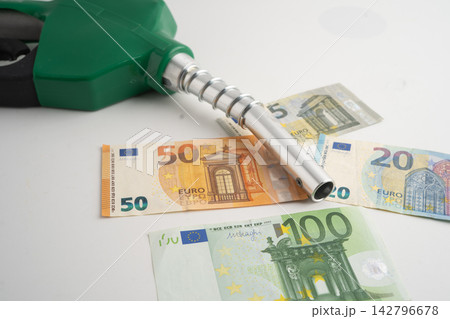 Gas pump, Fuel Nozzle with Euro money for cost energy. Gas pump, Fuel Nozzle with Euro money for cost energy. 142796678