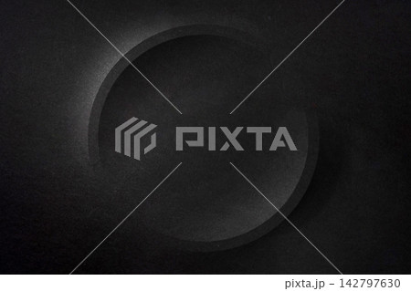 Dark black paper texture background with circular element and copy space for banner template advertising and graphic design Dark black paper texture background with circular element and copy space for banner template advertising and graphic design 142797630