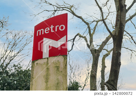 Metro sign near a station in Lisbon, Portugal during late afternoon hours Metro sign near a station in Lisbon, Portugal during late afternoon hours 142800072