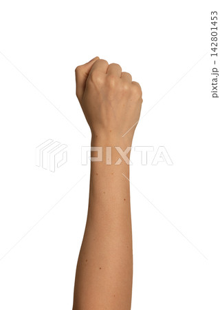 clenched fist arm clenched fist arm 142801453