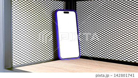 Mockup smartphone with a blank white screen and purple frame leans against a wooden shelf corner. 142801741