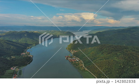 Danube river and mountains in Djerdap National Park at sunset Danube river and mountains in Djerdap National Park at sunset 142802838
