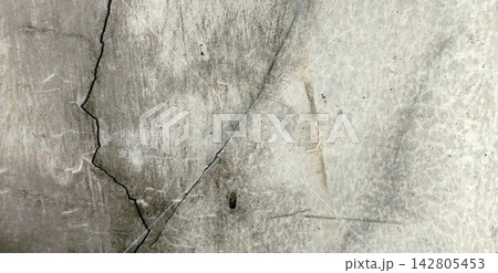 Cracked gray cement and concrete wall texture background Cracked gray cement and concrete wall texture background 142805453