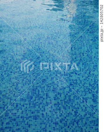 blue tiles of a swimming pool 142805702