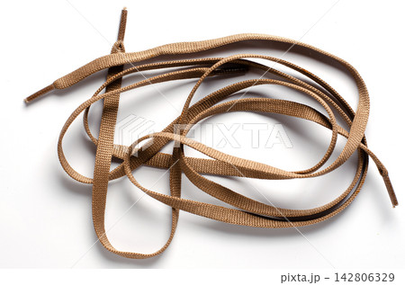 Shoelace on a white background Shoelace on a white background 142806329