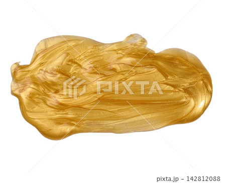 A smear of thick gold metallic paint or gel on an isolated background A smear of thick gold metallic paint or gel on an isolated background 142812088