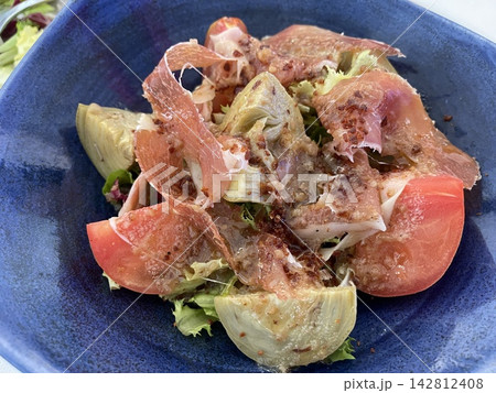 Artichokes Prepared and Served as a Mediterranean Vegetable Dish 142812408