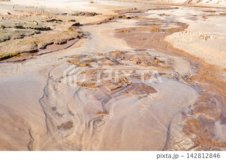 A sand mining operation in Brazil; a fantastic landscape rich in detail and color, featuring a sand mine in Brazil; selective focus. A sand mining operation in Brazil; a fantastic landscape rich in detail and color, featuring a sand mine in Brazil; selective focus. 142812846