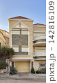 Modern residential villa exterior with garage and shutters 142816109