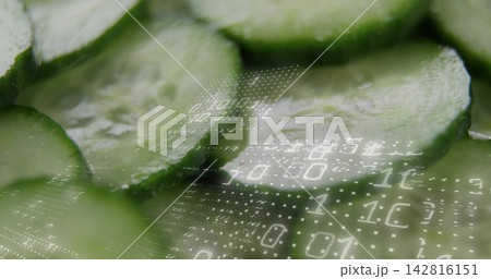 Showing overlapping cucumber slices shining with droplets rind seeds in studio, with binary digits 142816151