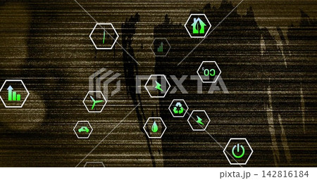 Displaying eco hexagon icons glowing on corrupted screen, with recycle leaf water power symbols 142816184