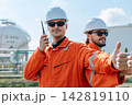 Refinery Engineer Talking Walkie Talkie Thumbs Up Outdoor Industrial Plant Facility. 142819110