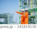 Refinery Engineers Discussion Pointing Direction Outdoor Chemical Plant Inspection. 142819116