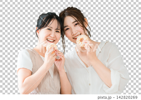 Women eating donuts, sweets, snacks, desserts 142820269