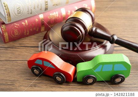 Hammer gavel judge with car vehicle accident, insurance coverage claim lawsuit court case. Hammer gavel judge with car vehicle accident, insurance coverage claim lawsuit court case. 142821188