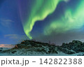 Tromso Norway, aurora borealis northern lights winter landscape at Rorvikneset Sommaroy 142822388