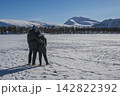 Tromso Norway, love couple in snow winter nature landscape at Prestvannet Lake 142822392
